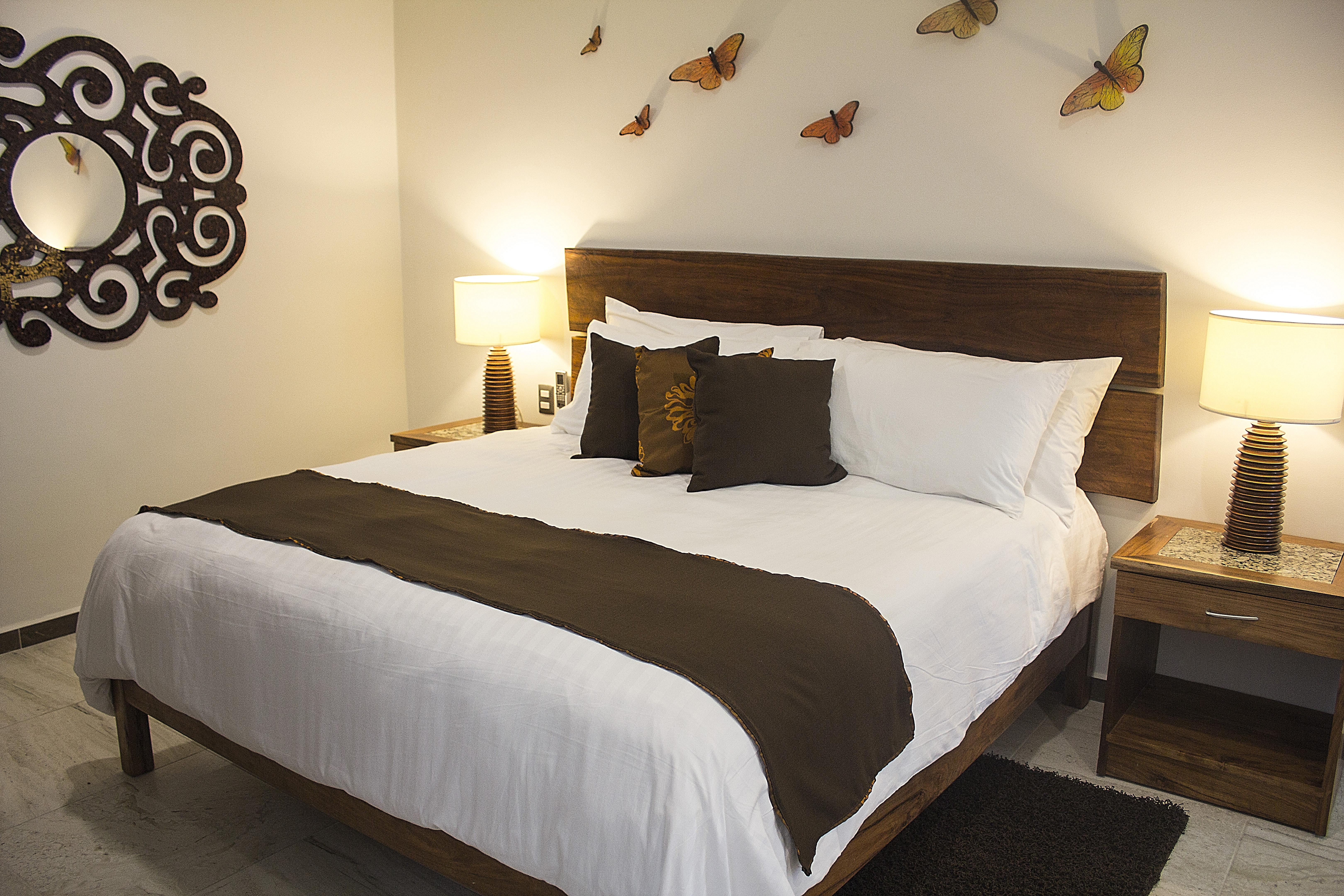 Casa Ticul Hotel Boutique - 5Th Ave (Adults Only) Playa del Carmen Eksteriør billede A bed with a bed runner